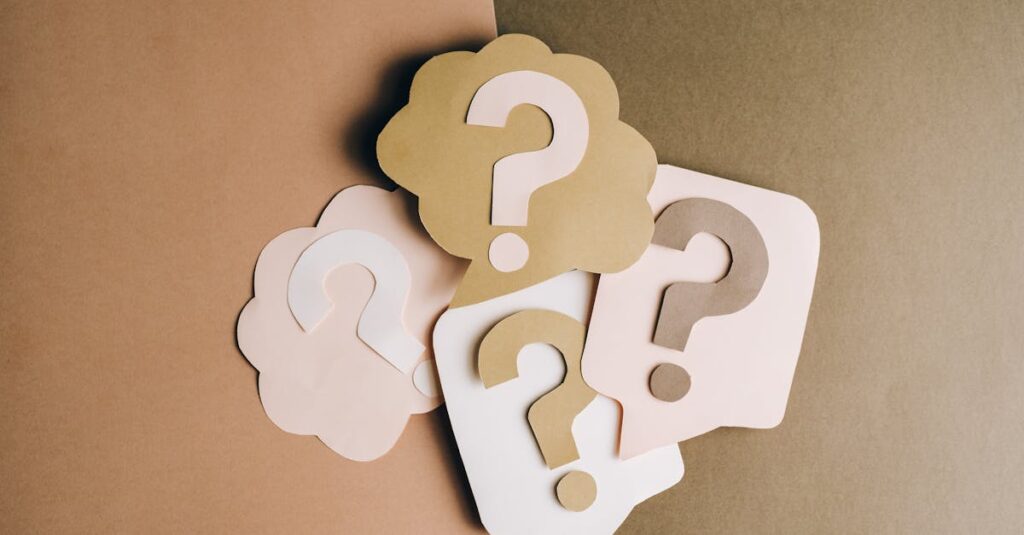 Question mark cutouts in layered paper craft style on a brown backdrop, conceptual art.